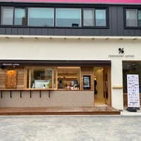 텐퍼센트 커피 장유 경동리인점 로고
