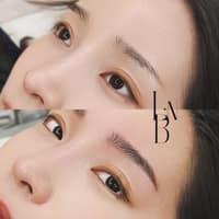 더 리움 브로우 로고
